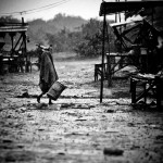 One Hour under the Monsoon Rain. ©Omar Havana / SIPAApril 2013. Chong Kneas Village. Siem Reap. Cambodia