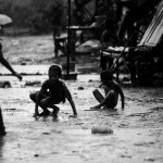 One Hour under the Monsoon Rain. ©Omar Havana / SIPAApril 2013. Chong Kneas Village. Siem Reap. Cambodia