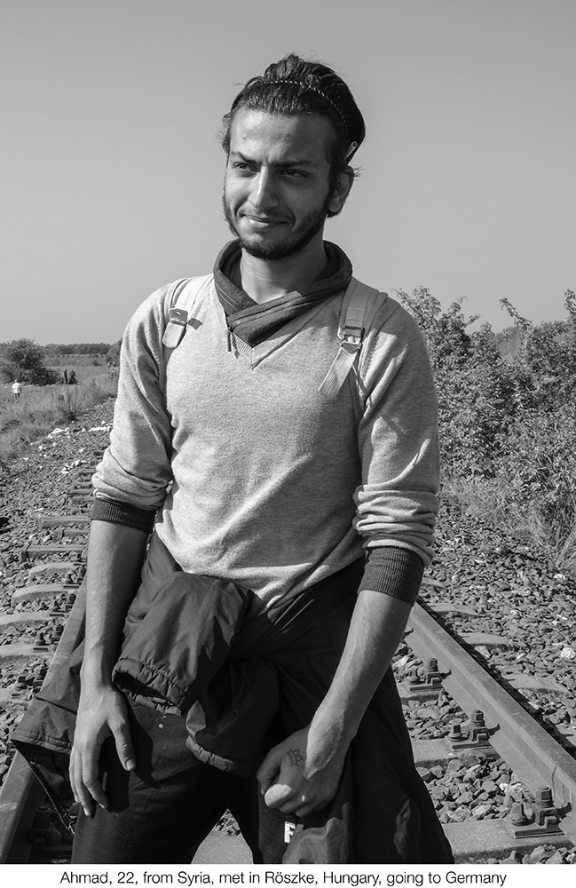 Refugee from Syria with his family, on the railway to the transit zone, Röszke