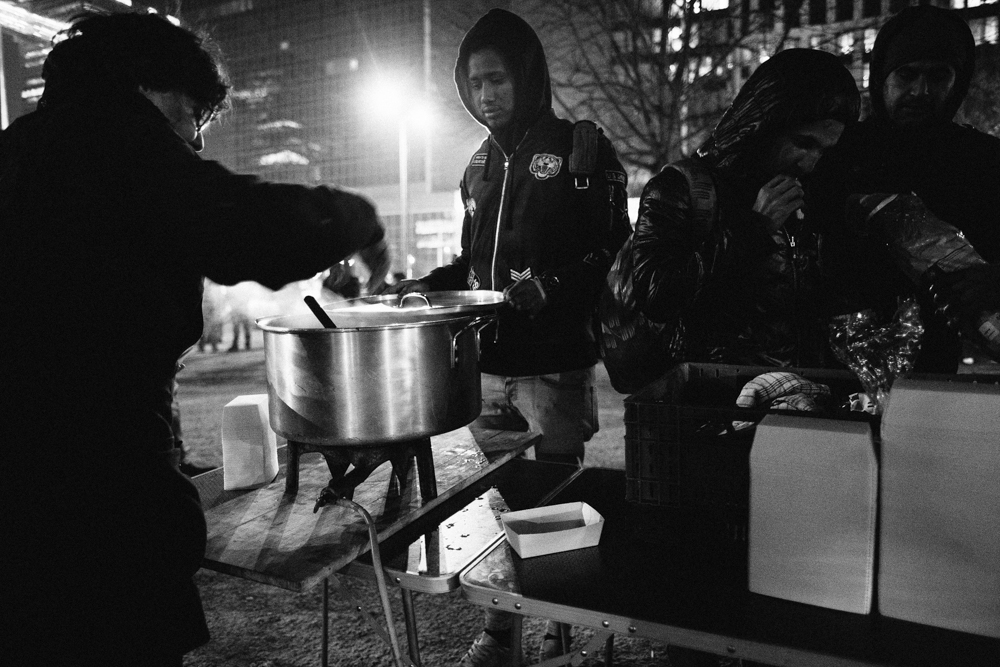 Bruxelles, 21 February 2018

The Maximiliaanpark in Brussels is  a new stop for refugees wanting to get to the UK after the dismantling of the Calais camp in France (aka The Jungle).

Every night, volunteers bring hot drinks and food to them.

Weeks ago, at the start of the coldest season, a group of volunteer started offering night shelter in their apartments. 
They go to the park, they pick some of them and drive them to warm shelters for the night.