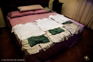 Clothing of the triplets on the bed where they sleep in summer. Noelia always dress them equal. 2012 Seville, Spain   Ropa de los trillizos sobre la cama donde duermen en verano. Noelia los viste siempre iguales. Sevilla, España 2012